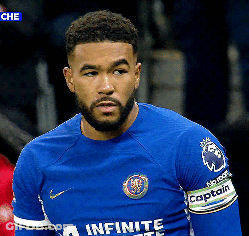 A Soccer Player Wearing A Blue Shirt That Says Infinite GIF