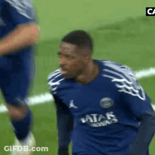 A Soccer Player Wearing A Blue Shirt That Says Qatar Airways GIF