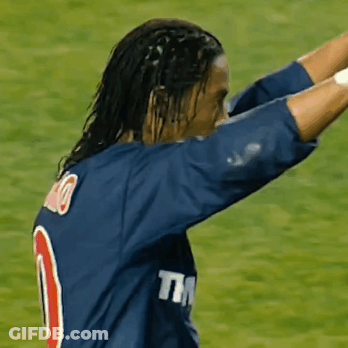 A Soccer Player Wearing A Blue Shirt With The Number 10 On It GIF