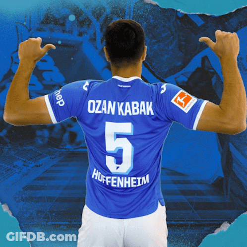 A Soccer Player Wearing A Blue Shirt With The Number 5 On It GIF