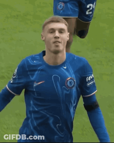 A Soccer Player Wearing A Blue Shirt With The Word Fev On The Sleeve GIF