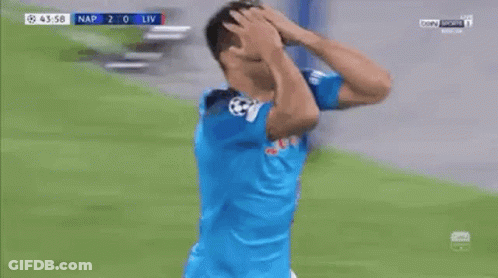 A Soccer Player Wearing A Blue Shirt With The Word Lete On It Is Celebrating A Goal . GIF