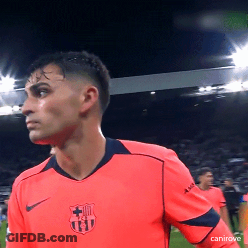 A Soccer Player Wearing A Bright Pink Shirt With A Fcb Logo On It GIF