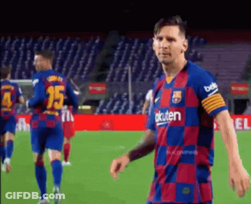 A Soccer Player Wearing A Checkered Shirt With The Word Rakuten On It GIF