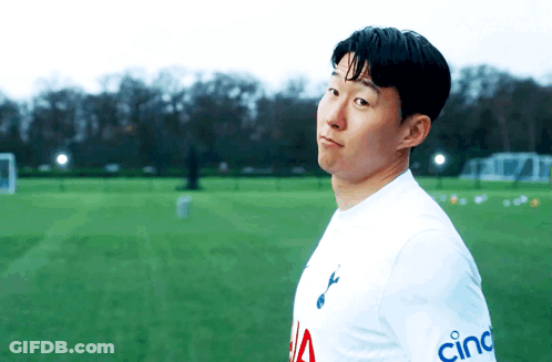A Soccer Player Wearing A Cincinnati Shirt Stands On A Field GIF