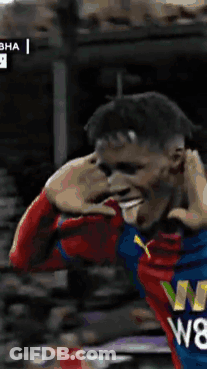 A Soccer Player Wearing A Colorful Shirt With The Number W8 On It GIF