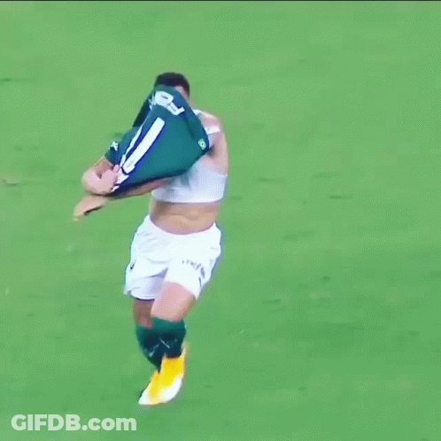A Soccer Player Wearing A Crop Top And Shorts With The Number 6 On His Shorts GIF
