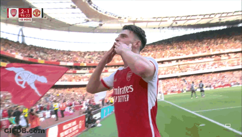 A Soccer Player Wearing A Emirates Jersey Celebrates A Goal GIF