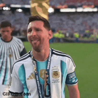 A Soccer Player Wearing A Fifa World Cup Trophy Around His Neck GIF
