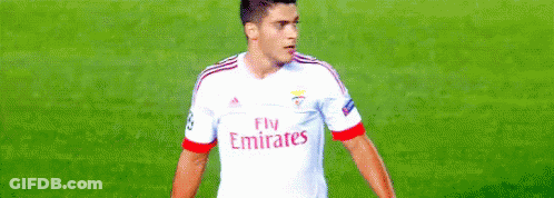 A Soccer Player Wearing A Fly Emirates Jersey GIF