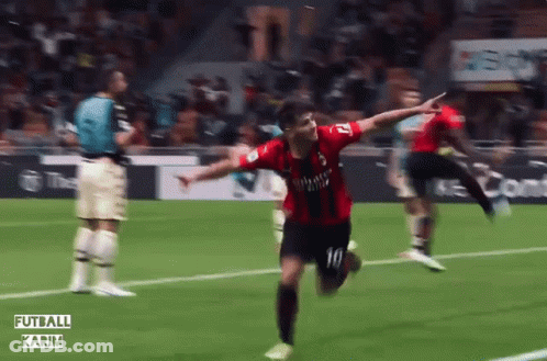 A Soccer Player Wearing A Fly Emirates Jersey Is Running On The Field GIF