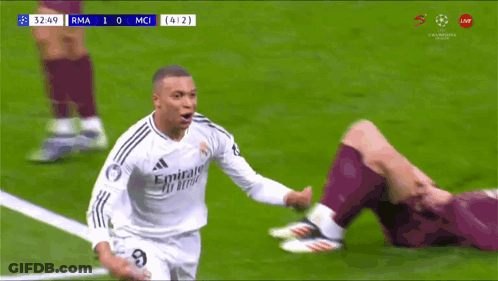 A Soccer Player Wearing A Fly Emirates Jersey Runs On The Field GIF