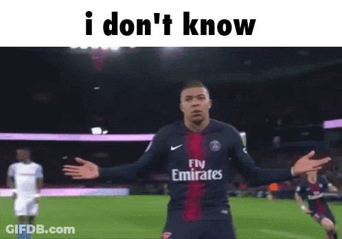 A Soccer Player Wearing A Fly Emirates Jersey Stands On A Field GIF