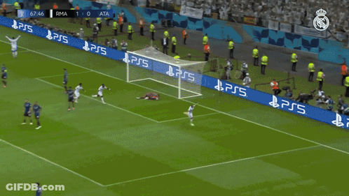 A Soccer Player Wearing A Fly Emirates Shirt Celebrates GIF
