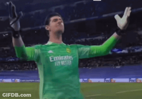 A Soccer Player Wearing A Green Jersey That Says " Emirates Fly Better " GIF