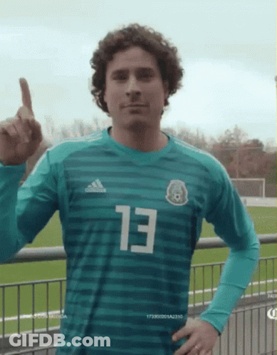 A Soccer Player Wearing A Green Jersey With The Number 13 On It GIF