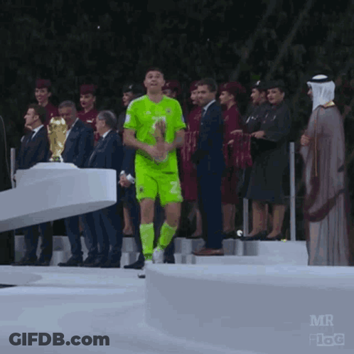 A Soccer Player Wearing A Green Jersey With The Number 2 On It GIF