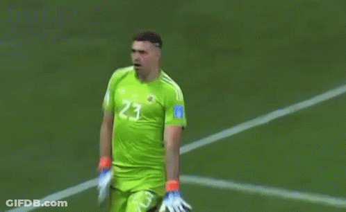 A Soccer Player Wearing A Green Jersey With The Number 23 On It Is Standing On A Field . GIF