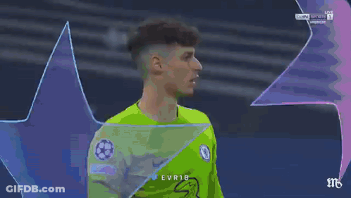 A Soccer Player Wearing A Green Jersey With The Word Evr18 On The Front GIF