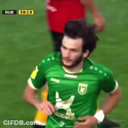 A Soccer Player Wearing A Green Shirt That Says David On It GIF