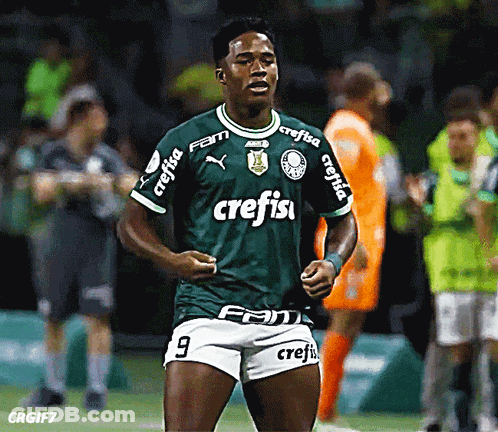 A Soccer Player Wearing A Green Shirt With Crefisa On The Sleeves GIF