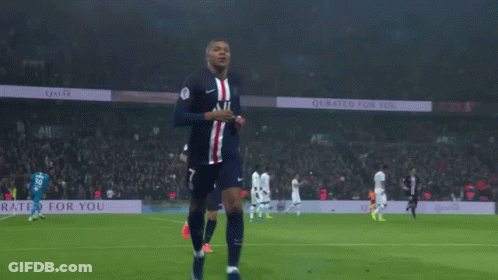 A Soccer Player Wearing A Jersey That Says All Is Celebrating GIF