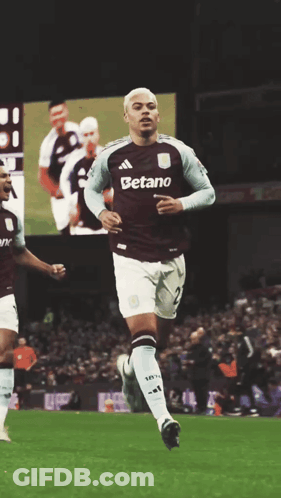 A Soccer Player Wearing A Jersey That Says Betano On It GIF