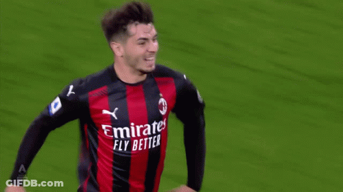 A Soccer Player Wearing A Jersey That Says ' Emirates Fly Better ' GIF