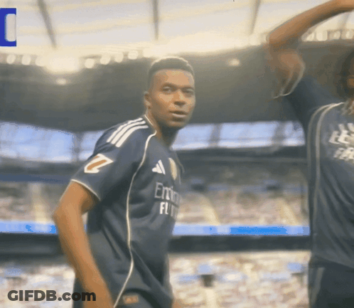 A Soccer Player Wearing A Jersey That Says Emirates Fly GIF