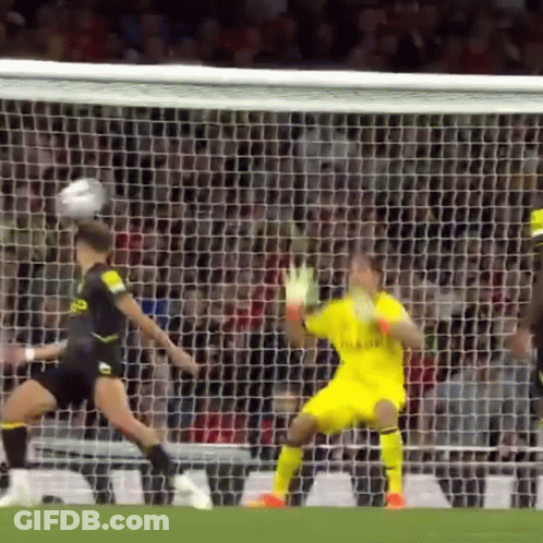 A Soccer Player Wearing A Jersey That Says Fly Emirates GIF