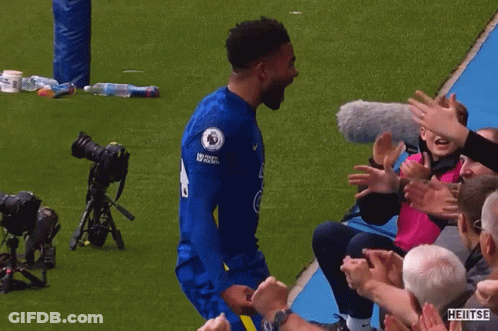 A Soccer Player Wearing A Jersey That Says No Room For Racism On The Sleeve GIF