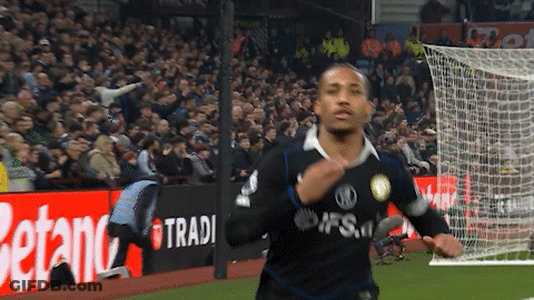 A Soccer Player Wearing A Jersey That Says Tradi GIF