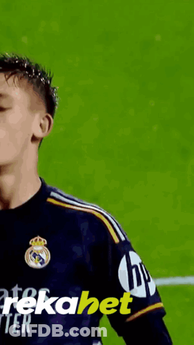 A Soccer Player Wearing A Jersey With Hp On The Sleeve GIF