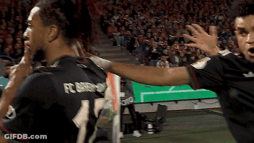 A Soccer Player Wearing A Jersey With The Number 11 On It GIF
