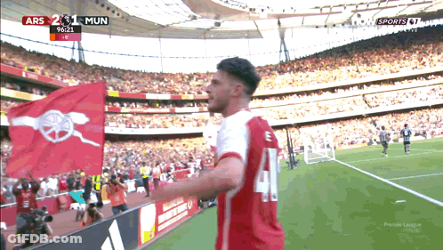 A Soccer Player Wearing A Jersey With The Number 14 On It GIF