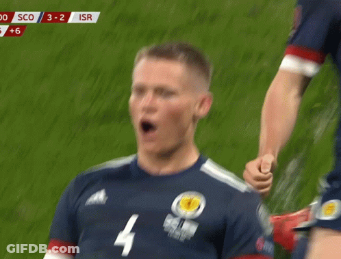 A Soccer Player Wearing A Jersey With The Number 4 GIF