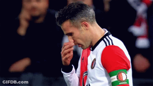 A Soccer Player Wearing A Jersey With The Word Feyenoord On The Armband GIF