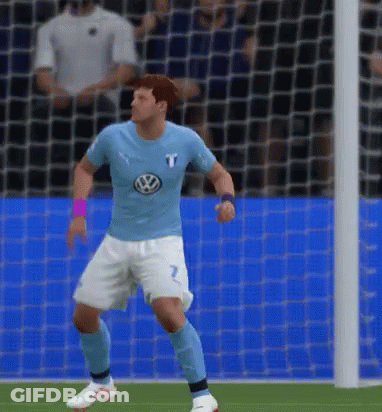 A Soccer Player Wearing A Light Blue Shirt With A Volkswagen Logo On It GIF