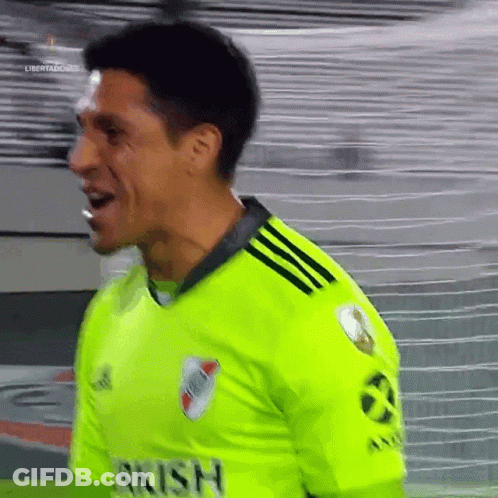 A Soccer Player Wearing A Neon Green Jersey That Says Rrish On It GIF