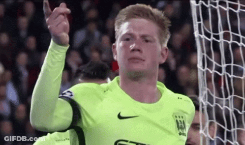 A Soccer Player Wearing A Neon Green Nike Jersey GIF