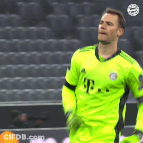 A Soccer Player Wearing A Neon Green T-Mobile Shirt GIF