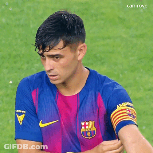 A Soccer Player Wearing A Nike Jersey With A Captain Armband On His Arm GIF