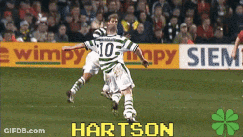 A Soccer Player Wearing A Number 10 Jersey Is Jumping In The Air GIF