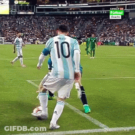 A Soccer Player Wearing A Number 10 Jersey Kicks The Ball GIF