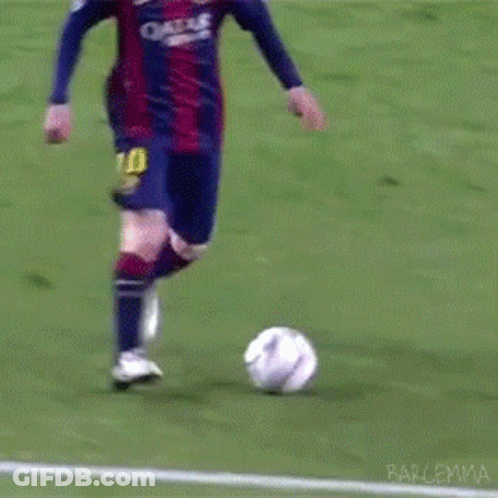 A Soccer Player Wearing A Number 10 Jersey Kicks The Ball GIF