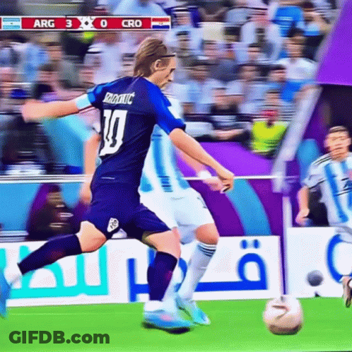 A Soccer Player Wearing A Number 10 Jersey Kicks The Ball GIF