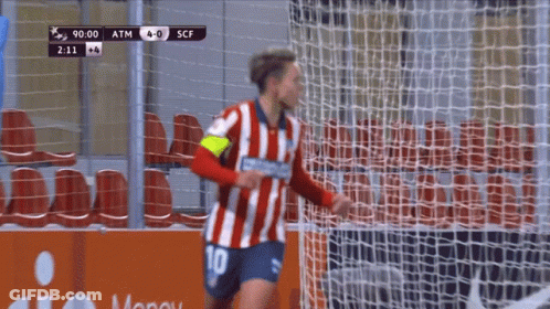 A Soccer Player Wearing A Number 10 Jersey Runs Towards The Goal GIF