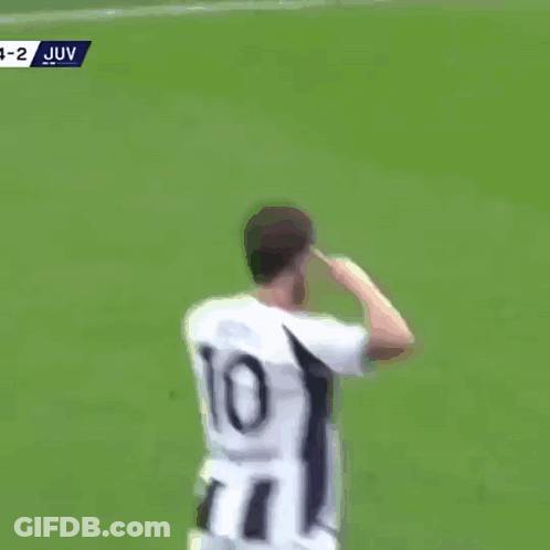 A Soccer Player Wearing A Number 10 Jersey Stands On A Field GIF