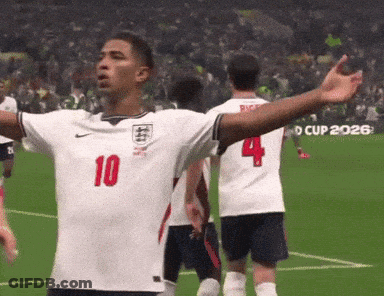 A Soccer Player Wearing A Number 10 Jersey Stands On A Field With His Arms Outstretched GIF