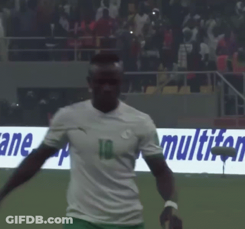 A Soccer Player Wearing A Number 10 Jersey Stands On The Field GIF